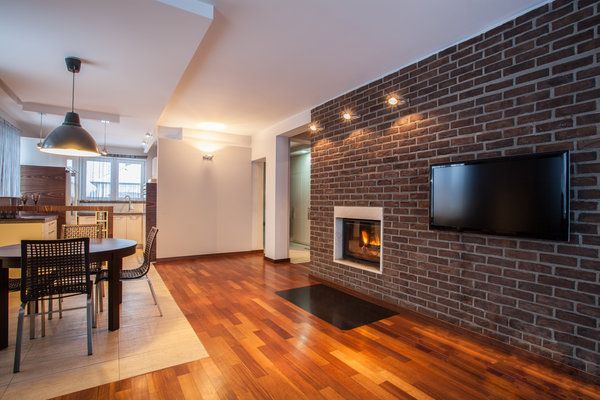 Dining room with brick hearth accent wall