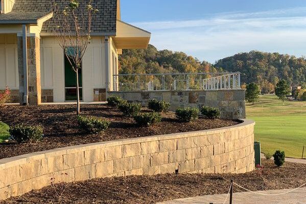 Beige stone block landscape and soil retaining wall