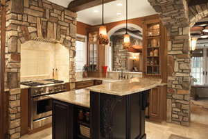 Luxury Kitchen with Stone Masonry Accents and Beams